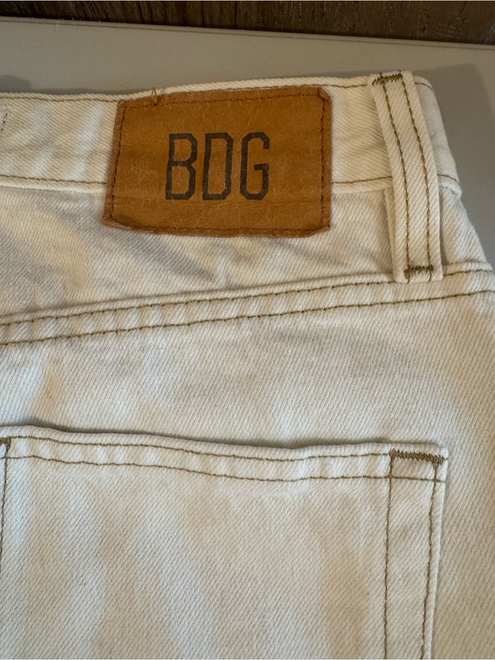 BDG Off-White High-Rise Denim Jeans with Tan Leather Patch